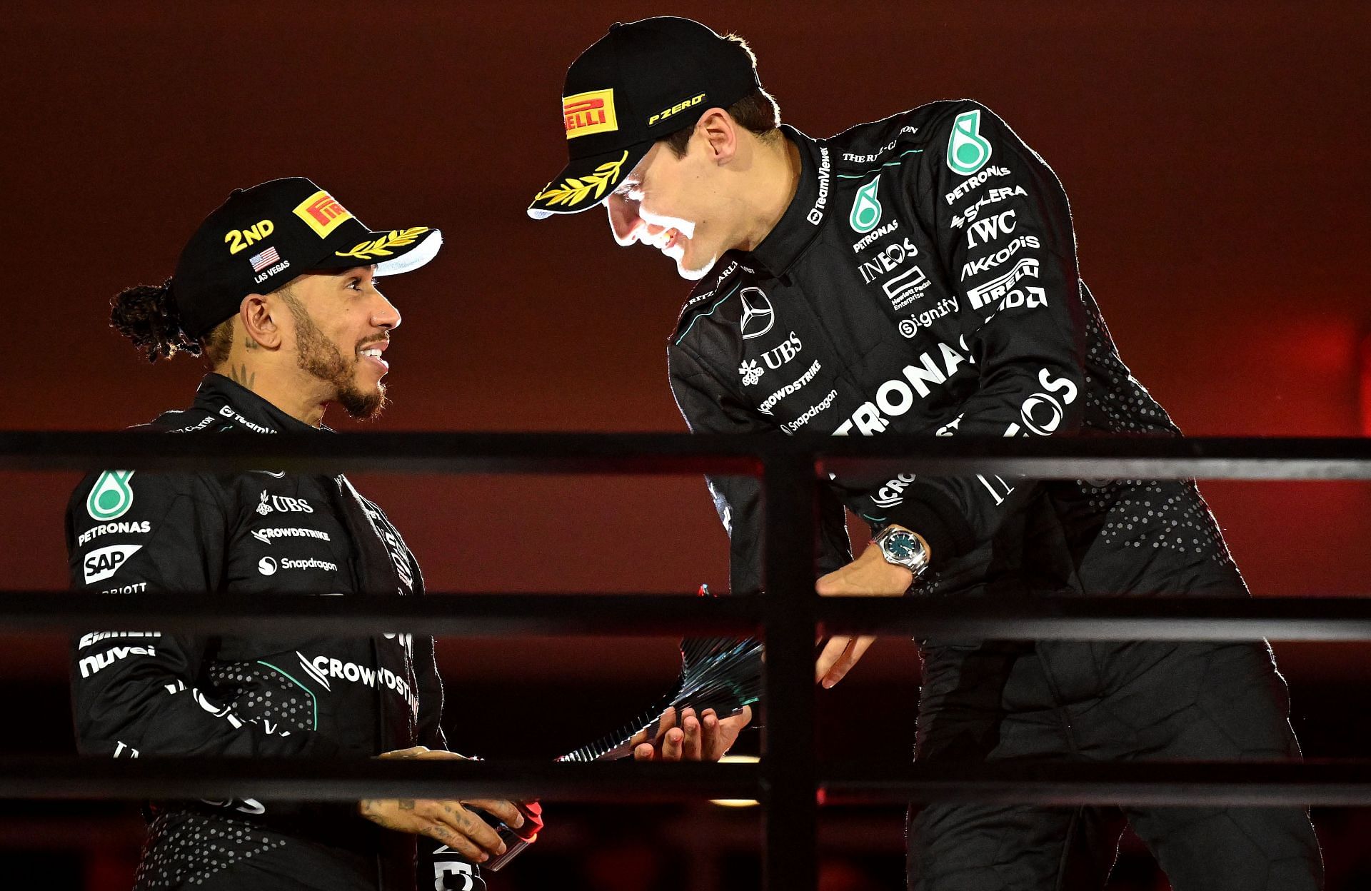 Race winner George Russell, right, speaks with his teammate and second-place finisher Lewis Hamilton at the F1 Las Vegas Grand Prix - Source: Getty